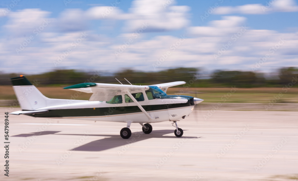 Landing airplane with motion blur