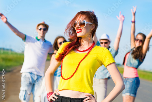 stylish young woman in sunglasses