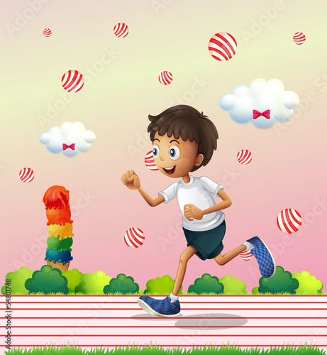 A boy jogging at the candyland