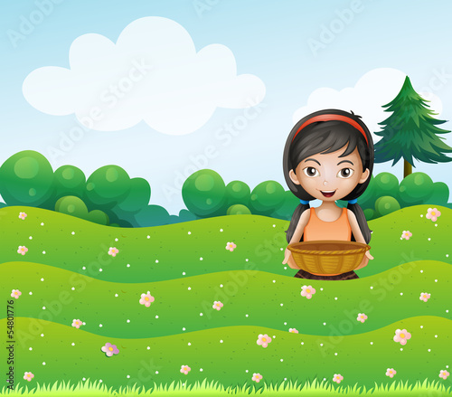 A girl with a basket at the hill