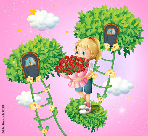 A girl holding a bouquet of flowers