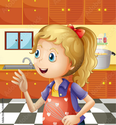 A young girl at the kitchen holding a mixer