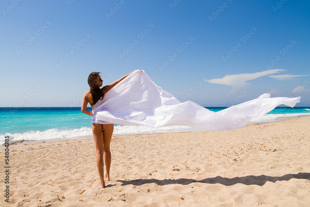 Girl With White sarong on The Beach.