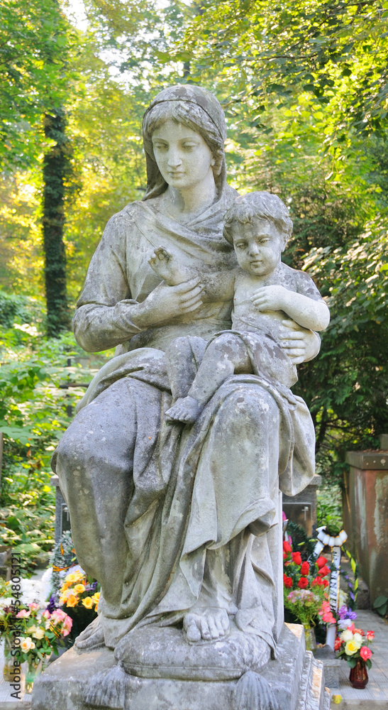 Old statue in Lychakiv Cemetery in Lviv, Ukraine