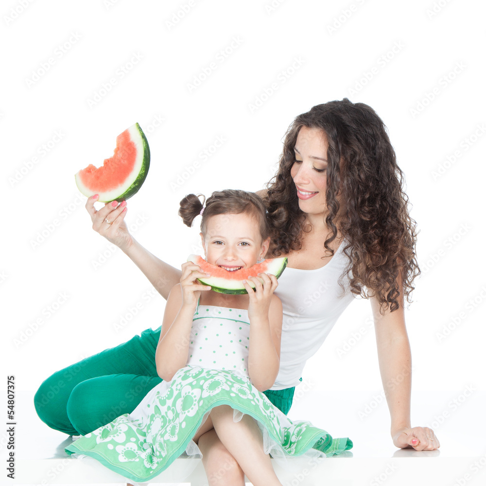 Happy mother and little girl with watermelon Happy mother and little girl with watermelon