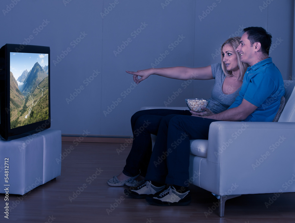 Happy Couple Watching Television Happy Couple Watching Television