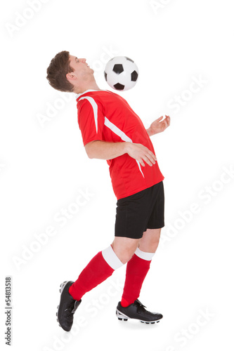Fototapeta Naklejka Na Ścianę i Meble -  Soccer Player With Ball