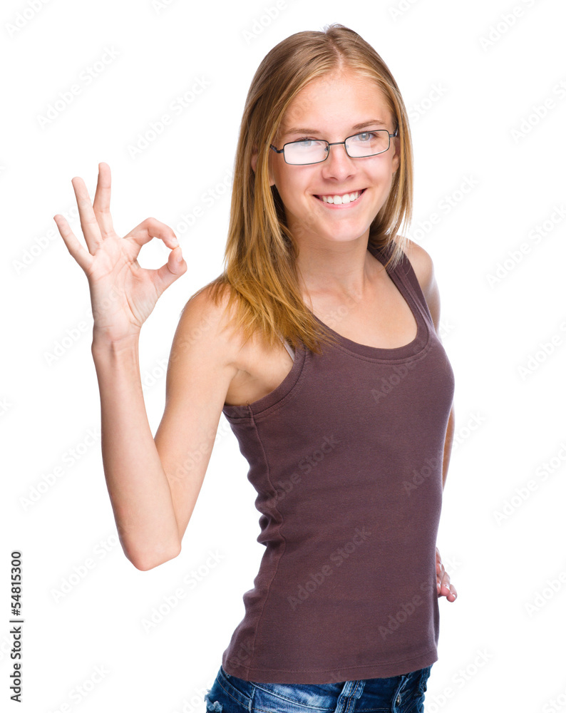 Young teen girl is showing OK sign Young teen girl is showing OK sign