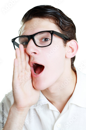 young man in glasses screaming