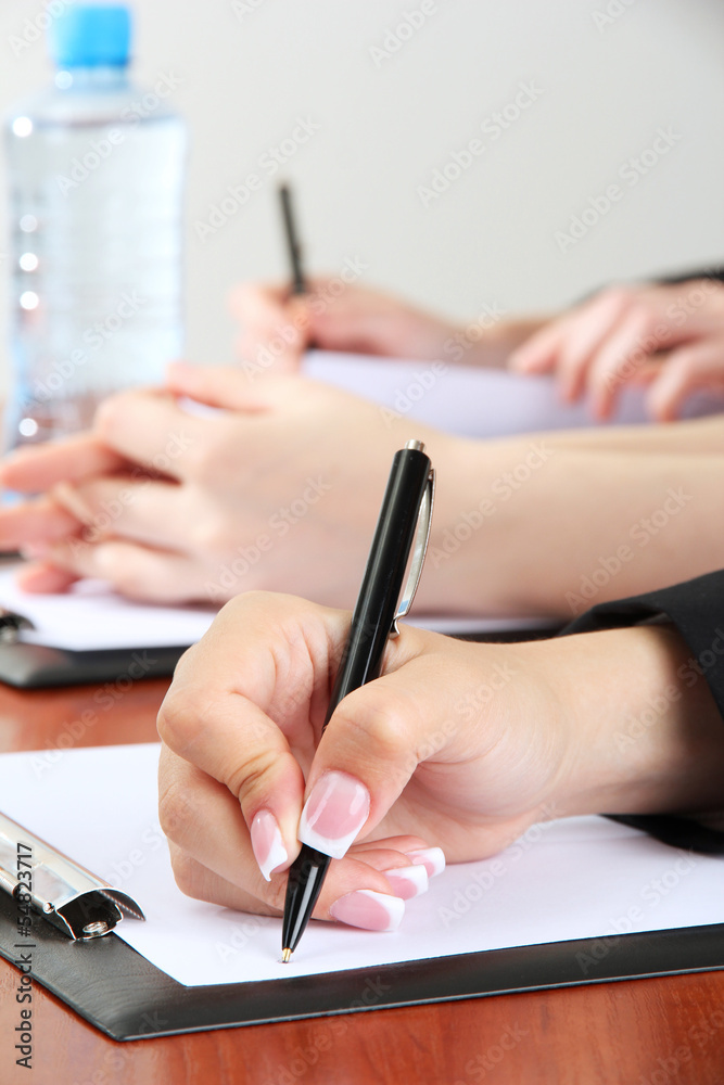 Close up of business people hands during teamwork Close up of business people hands during teamwork