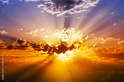 Sunset with clouds, light rays and other atmospheric effect
