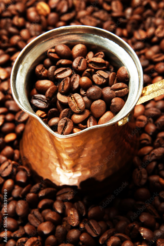Fototapeta premium Metal turk on coffee beans background