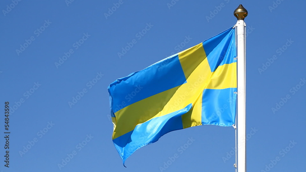 Flag of Swedish on a background sky