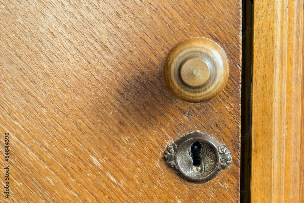 Wooden door handle and keyhole Wooden door handle and keyhole