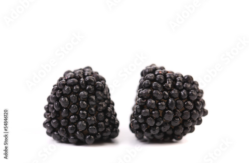 Two black jujube colored balls