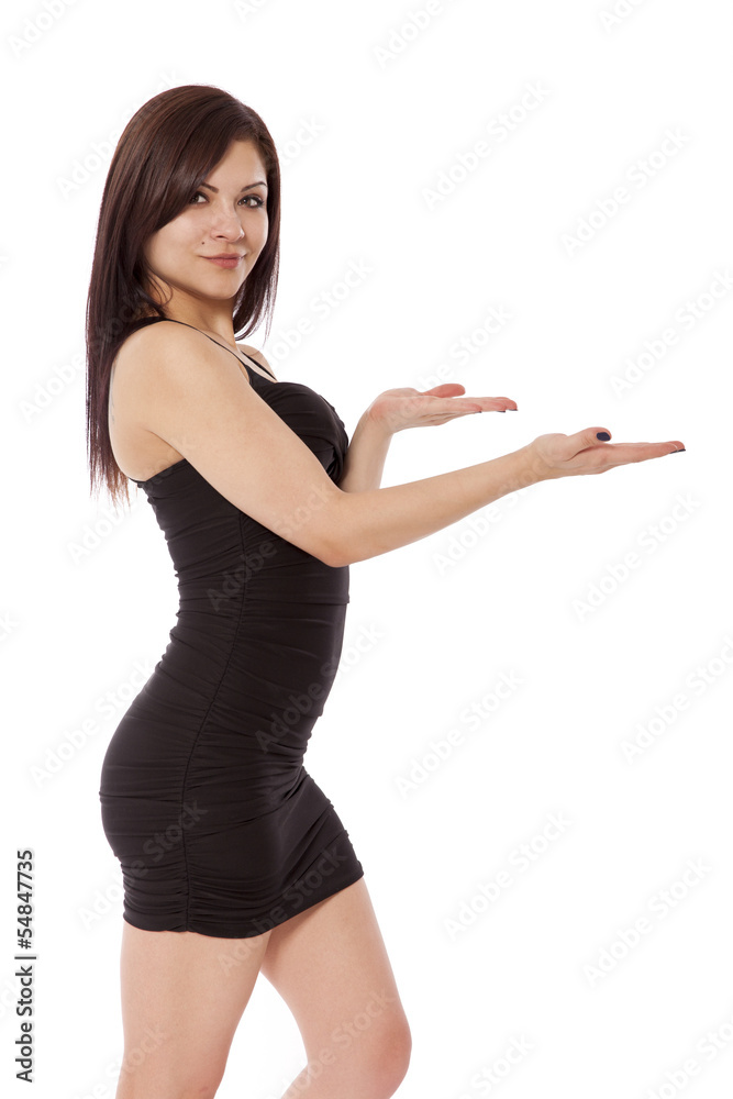 Spokes model in a little black dress holds her hands out towards