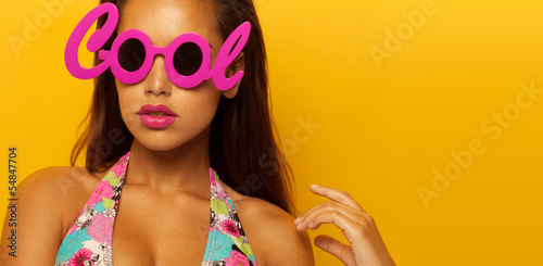 Portrait of a stylish girl wearing cool glasses