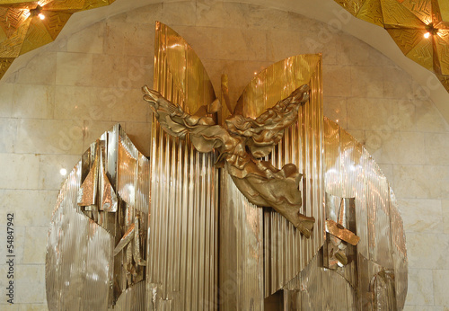 Moscow metro, sculpture on station Aviamotornaya (fragment) photo