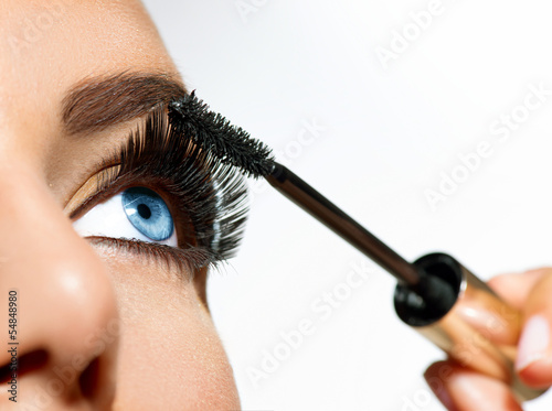 Mascara Applying. Long Lashes closeup photo
