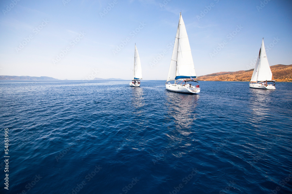 Group yacht sailing.