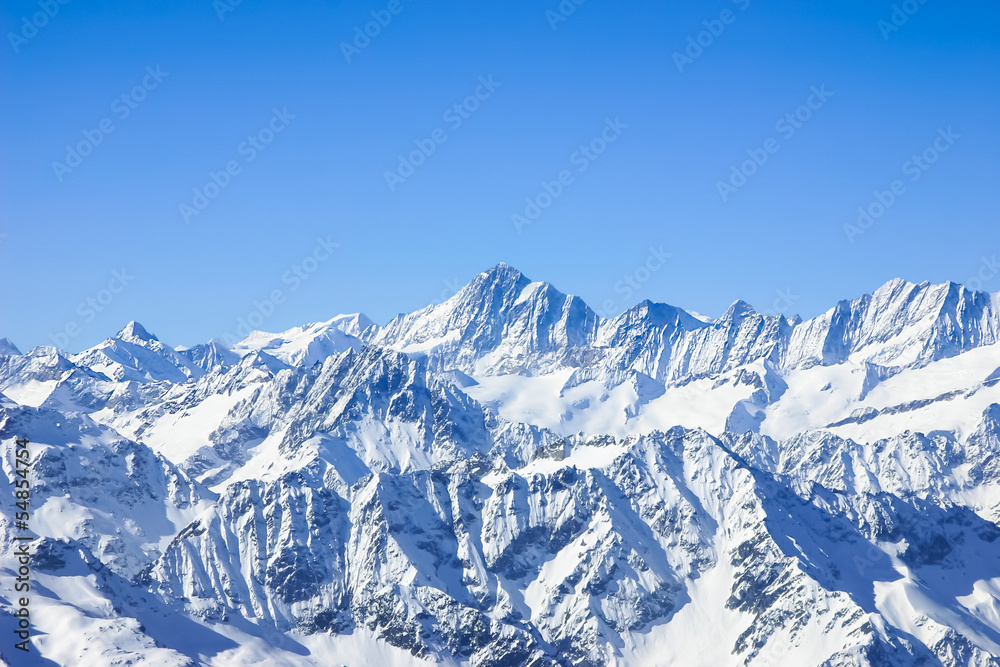 Panorama of Snow Mountain Range  Blue Sky from Titlis Peak, Swit