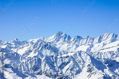 Panorama of Snow Mountain Range  Blue Sky from Titlis Peak, Swit © wirojsid