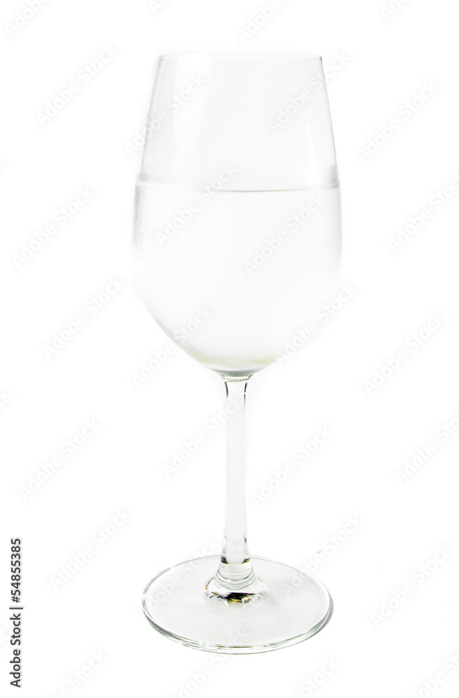 single wine glass and water on white background single wine glass and water on white background