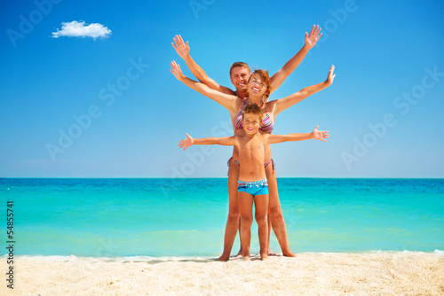 Happy Family Having Fun at the Beach. Vacation