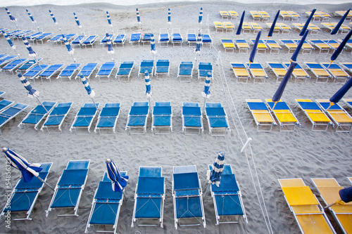 beach umbrellas with chairs