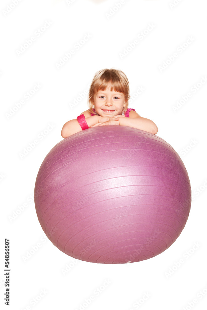 Happy little girl with fitness ball. Isolated on white Happy little girl with fitness ball. Isolated on white