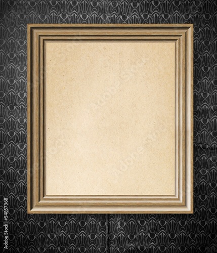 Elegant simple empty wooden frame with on vintage wallpaper