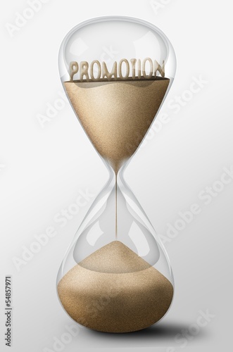 Hourglass with Promotion made of sand. Business concept