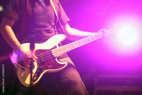 Guitarist in nightclub, blur in moving