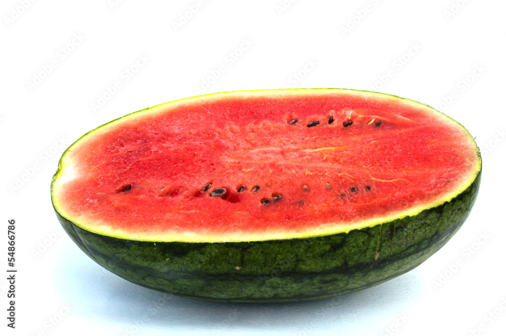 Half slice of ripe sweet watermelon on white background Half slice of ripe sweet watermelon on white background