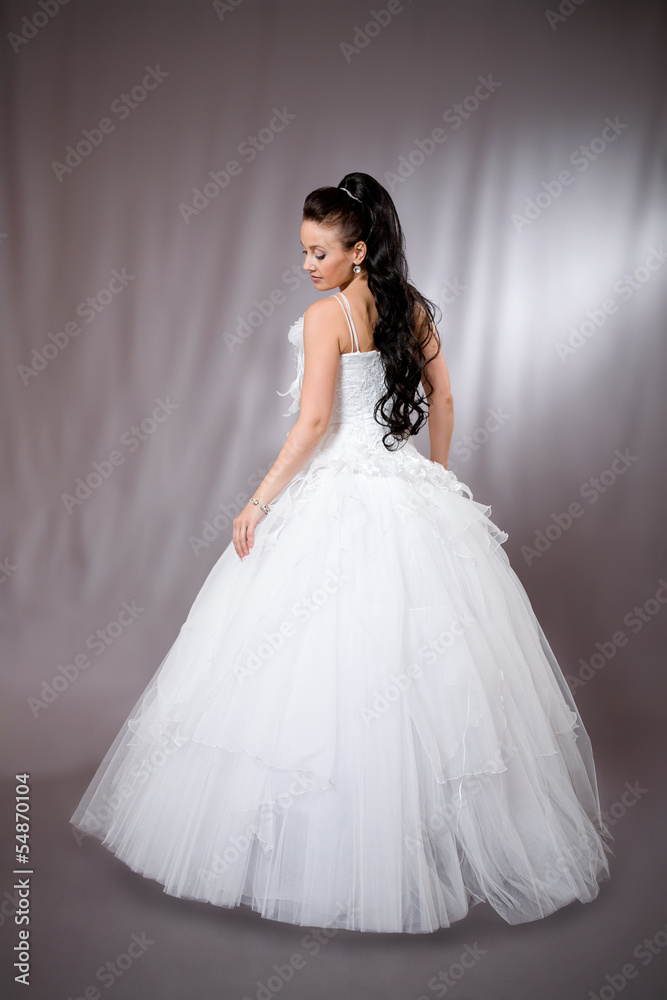 Woman in wedding gown.