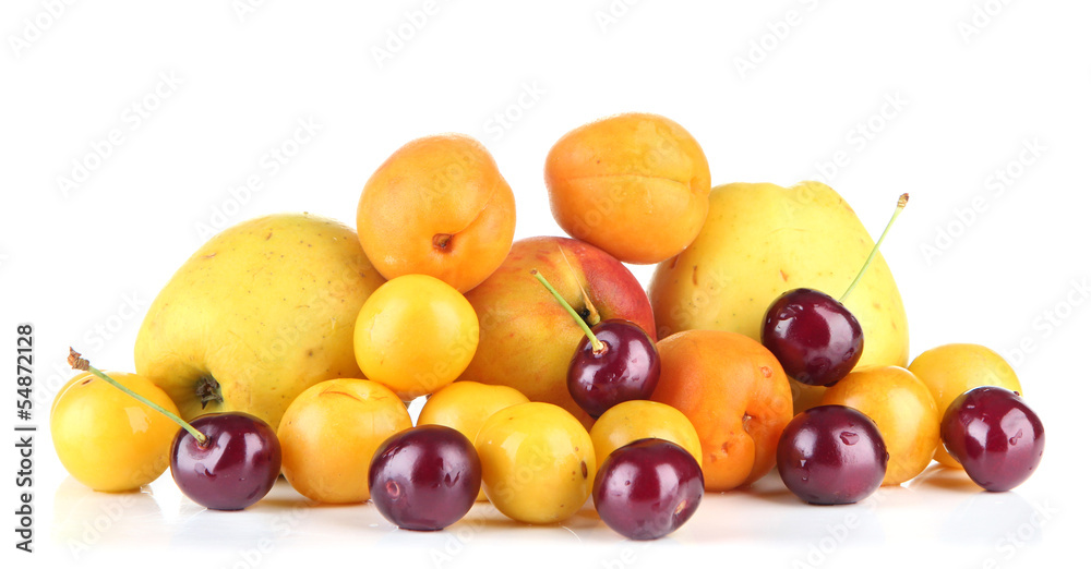Bright summer fruits isolated on white