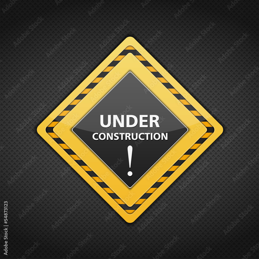 Under conctruction sign on dark metal background Under conctruction sign on dark metal background