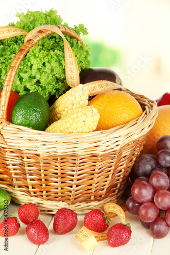 Fresh vegetables on table on light background