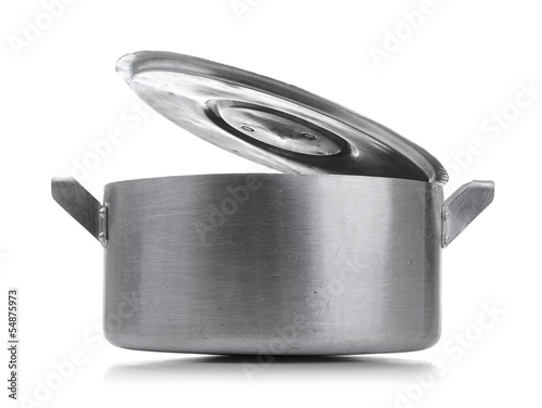 Old aluminum saucepan with open cap on white background.