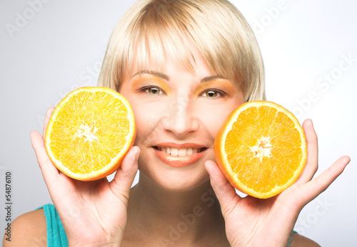 Woman with oranges