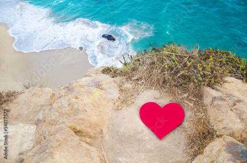 Heart on the top of hill next the ocean