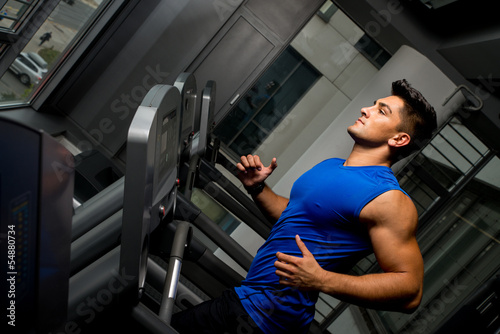 Running on treadmill in gym