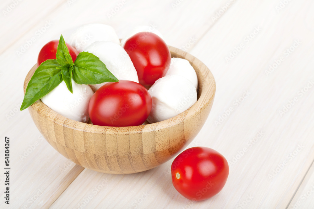 Mozzarella cheese with cherry tomatoes and basil Mozzarella cheese with cherry tomatoes and basil