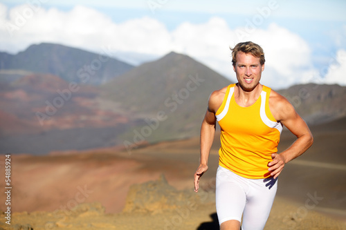 Running athlete - man runner sprinting fast