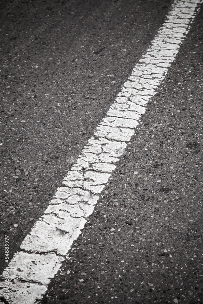 Old white line perspective. Road marking