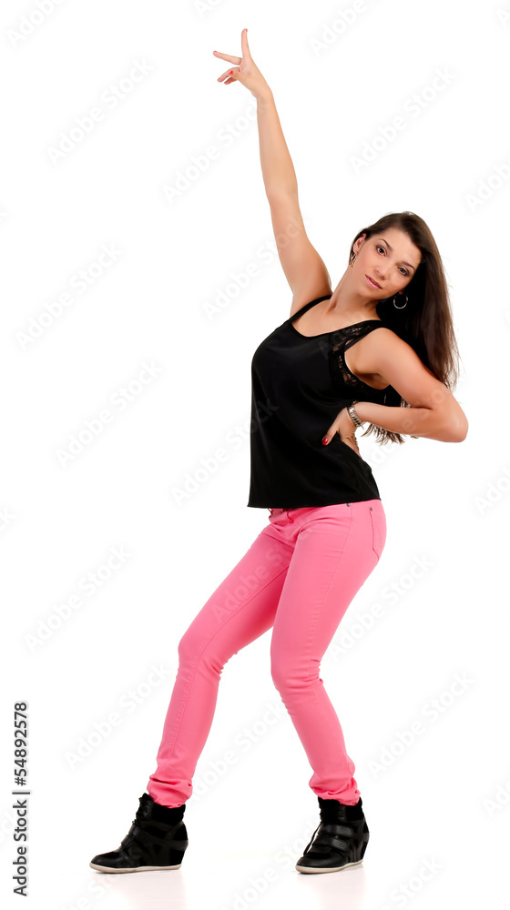 Young brunette performs dancing moves Young brunette performs dancing moves