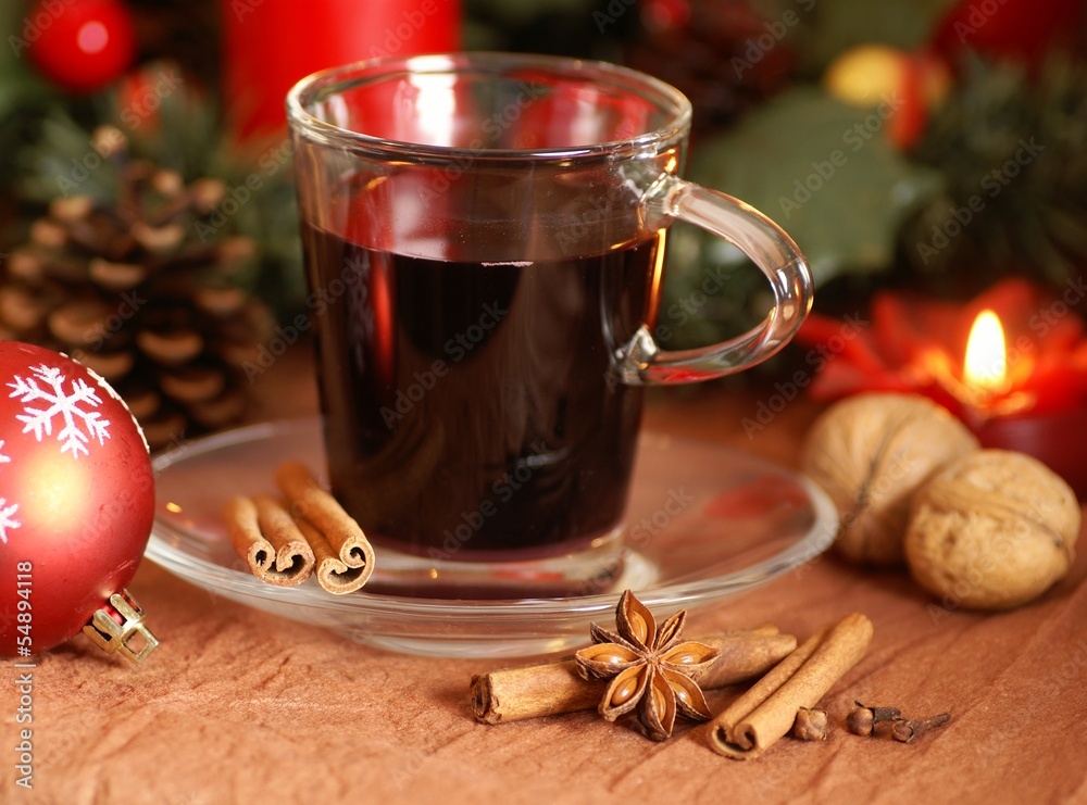 Hot wine with spices and christmas decorations Hot wine with spices and christmas decorations