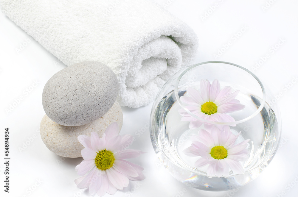 spa decoration with stones and daisies spa decoration with stones and daisies