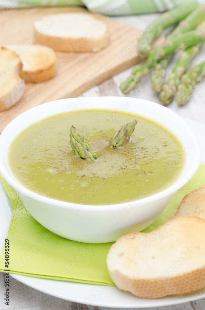 cream soup of asparagus and green peas with toasted bread cream soup of asparagus and green peas with toasted bread