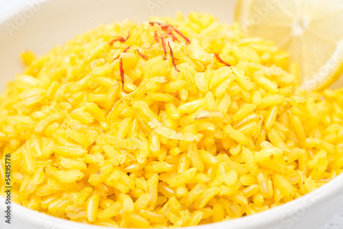 rice with lemon and saffron, close-up, selective focus